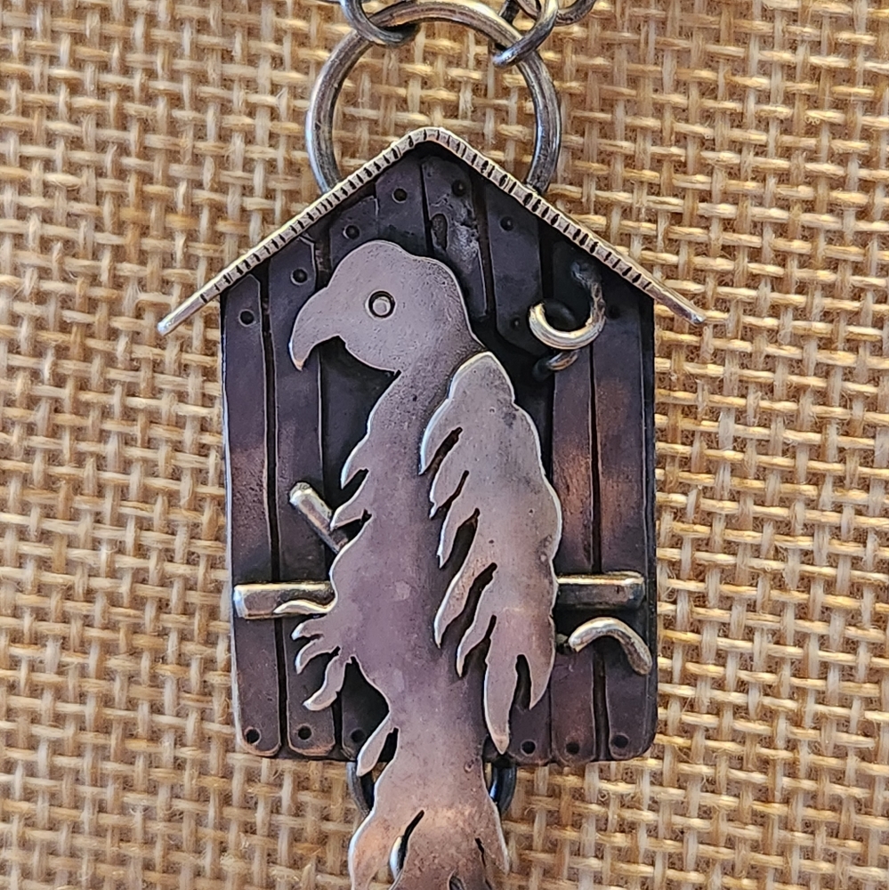 Sterling Silver one of a kind necklace by 6 shadows Parrot on a perch